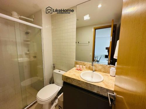 a bathroom with a toilet and a sink and a shower at Eco Summer Tambaú, LikeHome in Tambaú