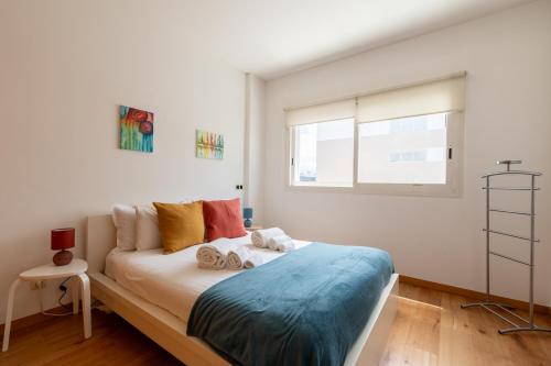 Ένα ή περισσότερα κρεβάτια σε δωμάτιο στο Modern apartment in Parque das Nações