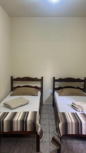 Katil atau katil-katil dalam bilik di Hotel Coutinho Pio XII