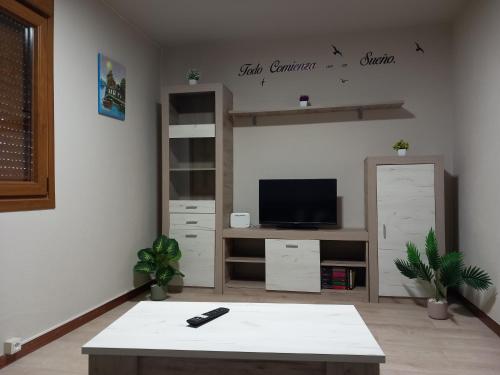TV a/nebo společenská místnost v ubytování Casa do Carpinteiro