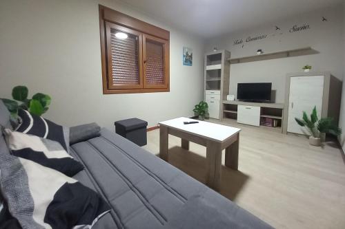 TV a/nebo společenská místnost v ubytování Casa do Carpinteiro