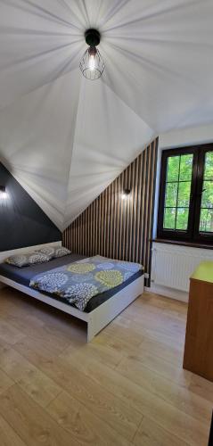 a bedroom with a bed in a tent at Domek Nadmorski przy plaży Ustka in Ustka