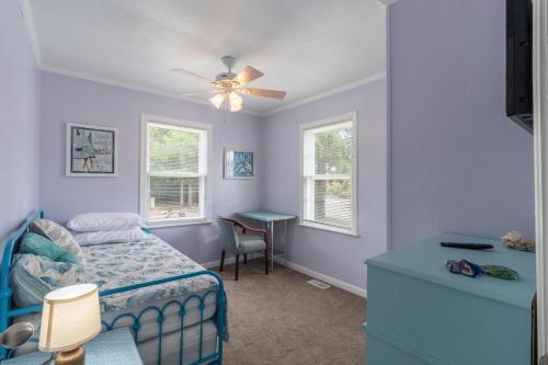 Postel nebo postele na pokoji v ubytování Shell'd Inn