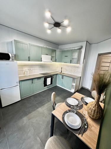 Η κουζίνα ή μικρή κουζίνα στο City Rooms Apartments