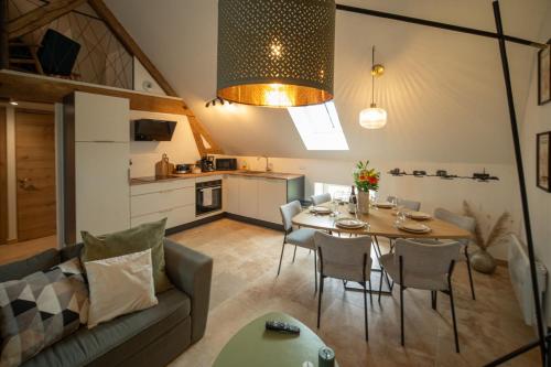 Η κουζίνα ή μικρή κουζίνα στο Appartement chaleureux le Grenier de Pommard