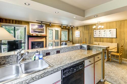 a kitchen with a sink and a counter top at Walk to Sun Valley Village Condo with Deck! in Sun Valley