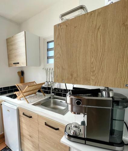 Una cocina o zona de cocina en Lever du soleil