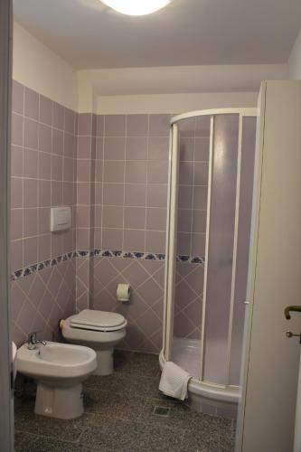 a bathroom with a toilet and a shower at Il Casaletto in Palombara Sabina