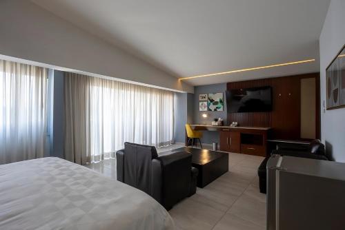 Letto o letti in una camera di Holiday Inn Puebla Finsa by IHG