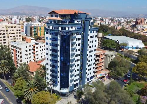 an overhead view of a tall blue building at Premium Apartamentos Torre Azul in Cochabamba