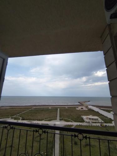 a view of an airport from a balcony with the ocean at Sumqayıt Abşeron City yaşayış kompleksi in Sumqayyt