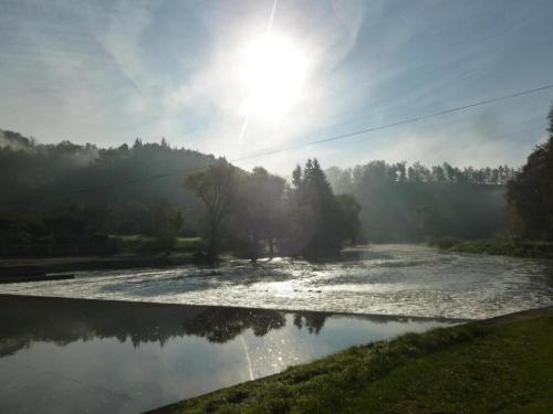 a river with the sun reflecting in the water at Pet-Friendly Holiday home in Bechyně