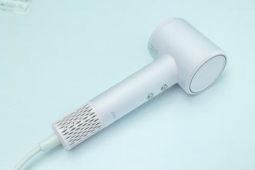 a white hairdryer on a white background at RD House in Katsuyama