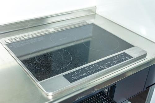 a stove top oven with a window on top at RD House in Katsuyama