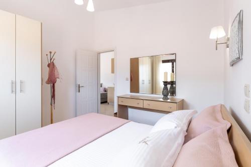 Ένα ή περισσότερα κρεβάτια σε δωμάτιο στο PELAGO BUNGALOWS