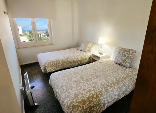 Postel nebo postele na pokoji v ubytování Innhome - La Marina