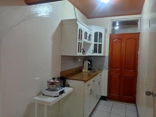 Dapur atau dapur kecil di Comodo acogedor y con salida independiente