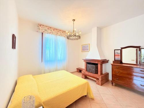 Ένα ή περισσότερα κρεβάτια σε δωμάτιο στο Cammini di Sale - Casa Vacanze tra le saline