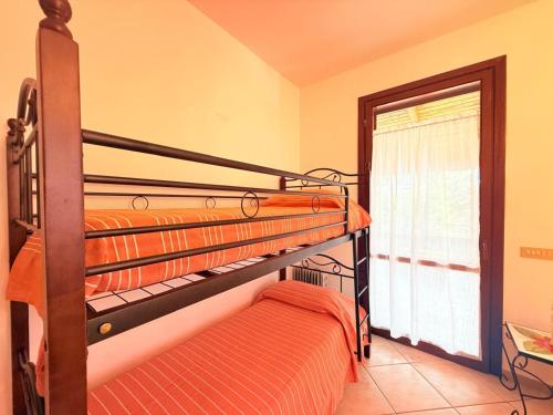 Ένα ή περισσότερα κρεβάτια σε δωμάτιο στο Cammini di Sale - Casa Vacanze tra le saline