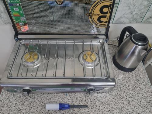 Příslušenství pro přípravu čaje a kávy v ubytování Nido del Altillo