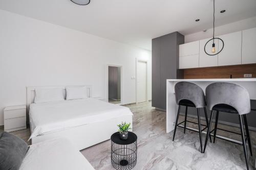 Katil atau katil-katil dalam bilik di Aura Tower Aparments by In Property