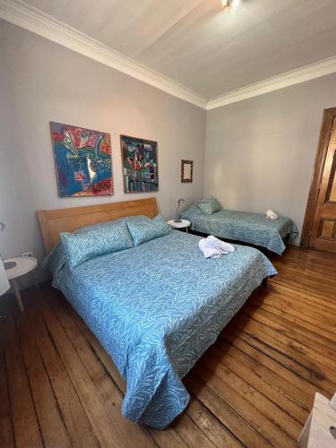 Кровать или кровати в номере Casa Urriola B&B