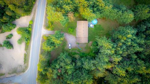 an overhead view of a park with trees and a road at Petals Suite Patio Nature Trails Bancroft in Bancroft