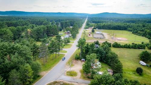 an aerial view of a road with trees and houses at Petals Suite Patio Nature Trails Bancroft in Bancroft