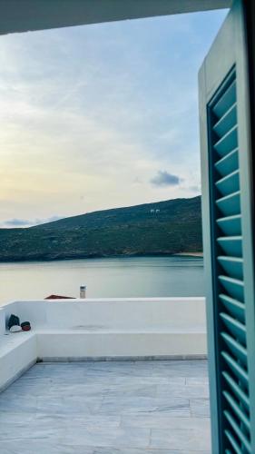 a view of a body of water from a building at Traditional two floor house 75m2 in Andros
