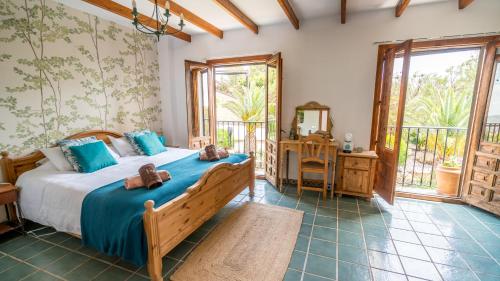 Una cama o camas en una habitación de La Campana de Finestrat