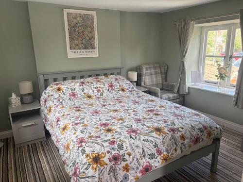 Ein Bett oder Betten in einem Zimmer der Unterkunft The Corner Cottage