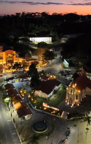 a view of a town at night with lights at Casa no centro de Miguel Pereira in Miguel Pereira