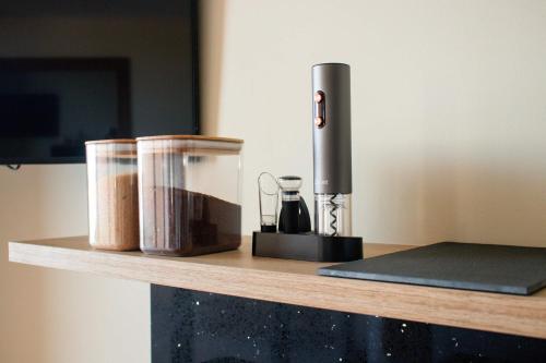 a counter with a food processor and a blender on it at Spacious Apartment with Balcony in El Zonte