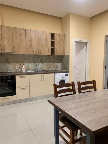 Kuchyň nebo kuchyňský kout v ubytování Apartament Joni