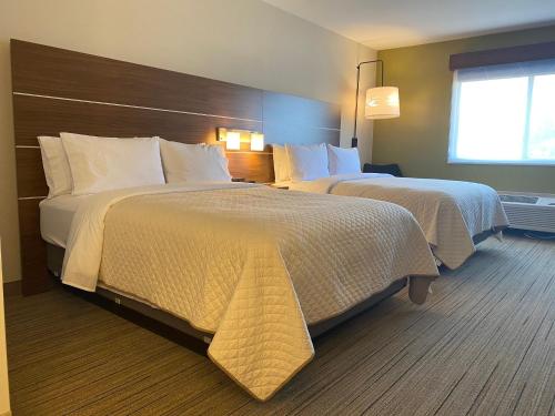 a hotel room with two beds and a window at Holiday Inn Express & Suites Mountain View Silicon Valley by IHG in Mountain View