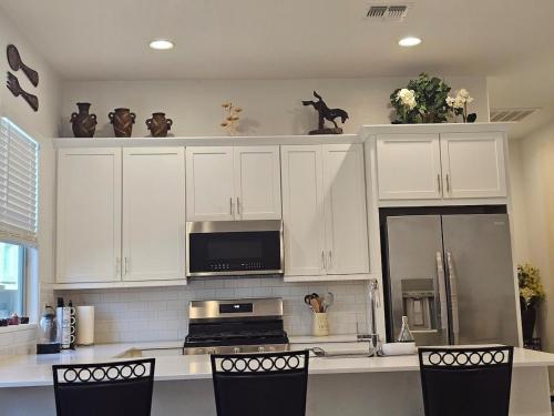 Cuisine ou kitchenette dans l'établissement genie palace at statefarm stadium