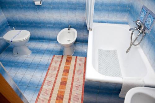 Kúpeľňa v ubytovaní Apartment Promajna 2588c