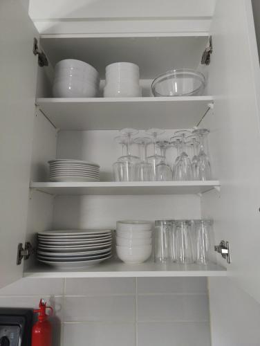 Η κουζίνα ή μικρή κουζίνα στο Elegant upper unit bungalow - 10 mn from downtown