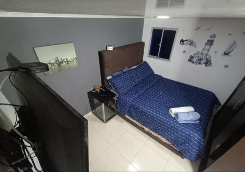 Ένα ή περισσότερα κρεβάτια σε δωμάτιο στο Espectacular apartamento familiar 1er piso - 04 personas - El Edén Centro Comercial