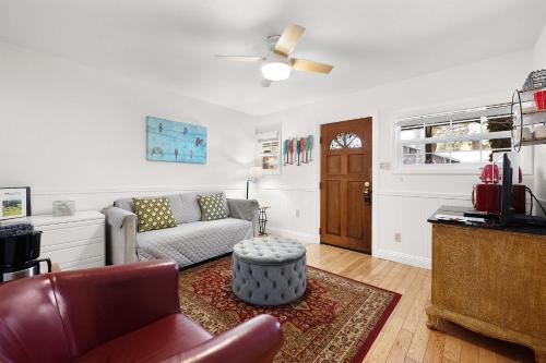 a living room with a couch and a table at Inn on the Russian River in Monte Rio