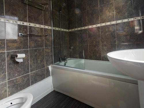 O baie la Newlands Lodge Deluxe Family Room 3