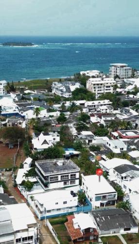 an aerial view of a city next to the ocean at sea crab in San Andrés