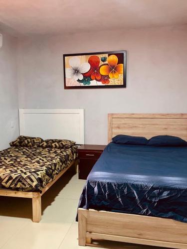 Postel nebo postele na pokoji v ubytování Casa Marea Suites