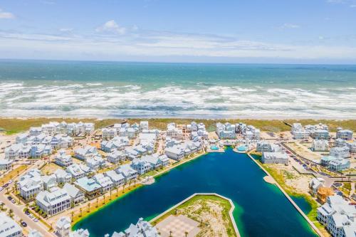 an aerial view of a resort near the ocean at Keepin' It Reel 234 LAK in Port Aransas