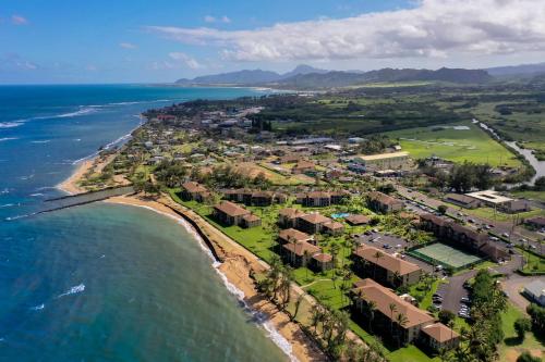 an aerial view of a resort next to the ocean at Pono Kai J107 in Kapaa