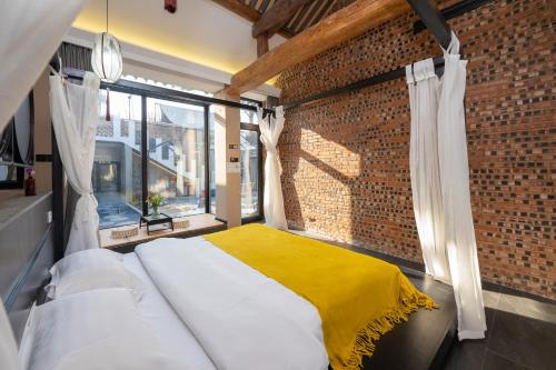 Katil atau katil-katil dalam bilik di View Ridge Xiaoyin B&B