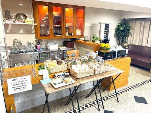 Kuchyň nebo kuchyňský kout v ubytování Business Inn Sennichimae Hotel