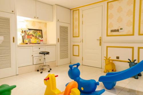 a room with toys on the floor at Dalat Palace Heritage Hotel in Da Lat