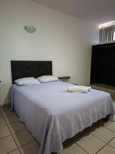 Hotel LAS OLASにあるベッド