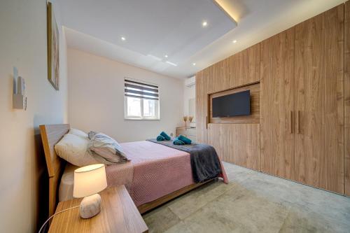 Voodi või voodid majutusasutuse Trident Cove Holiday Home toas